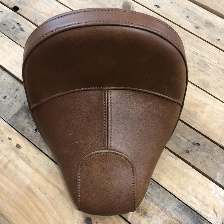 Indian Scout rider's solo seat in desert tan